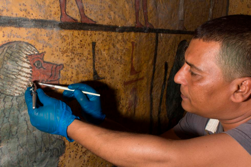 Wall paintings conservation work being conducted in the burial chamber of the tomb in spring 2016.